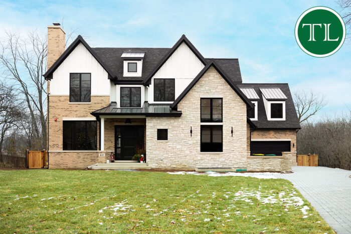 Modern Tudor House Signature Details: Arches, Windows, and Wood